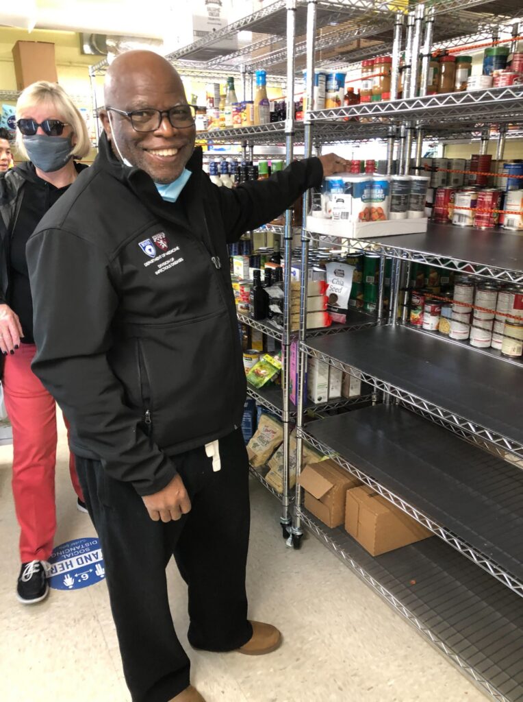 Volunteer stocking shelves