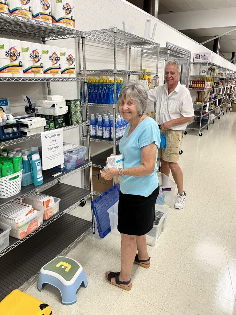 Volunteer stocking shelves