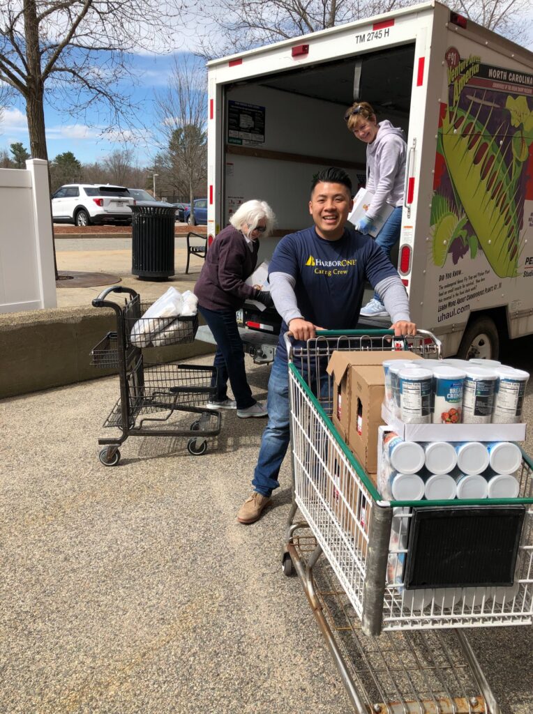 Volunteers unloading goods