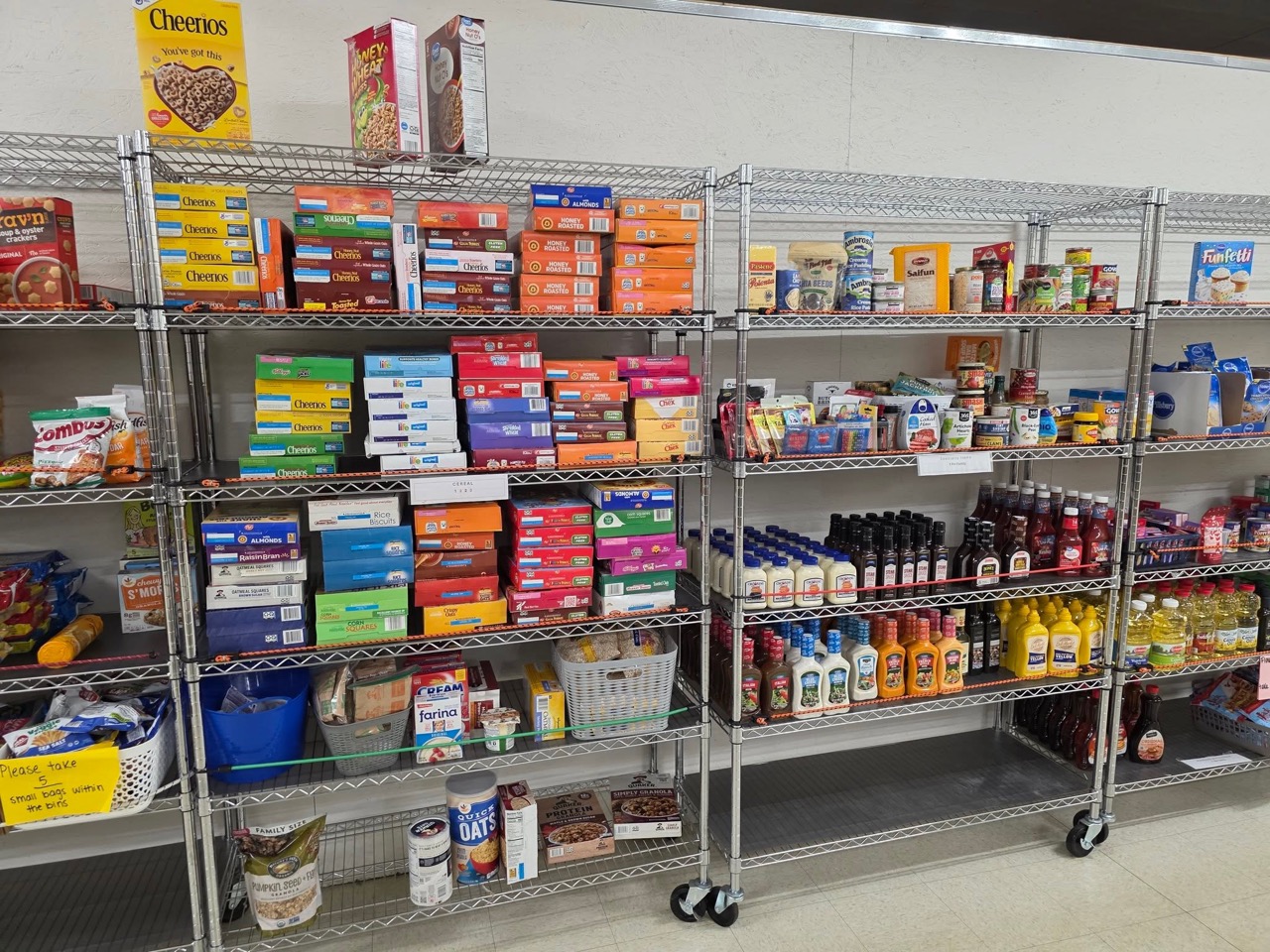 Shelves of dry goods at the Canton Helpline Food Pantry
